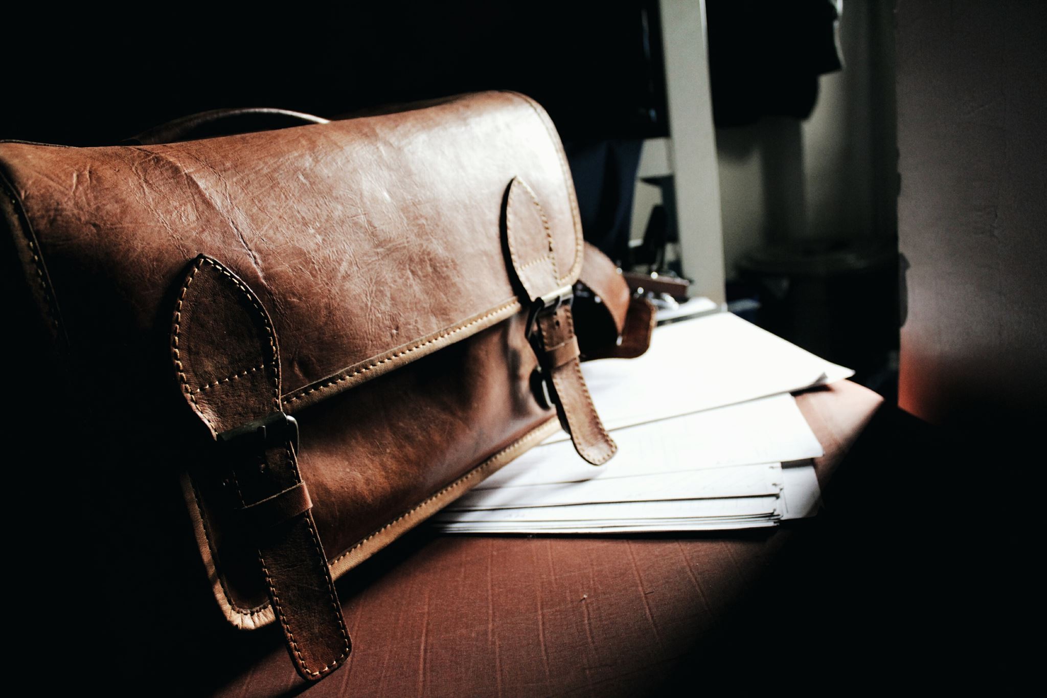 Professional briefcase on office desk